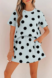 Light blue polka dot two-piece outfit set with crew neck top and shorts.