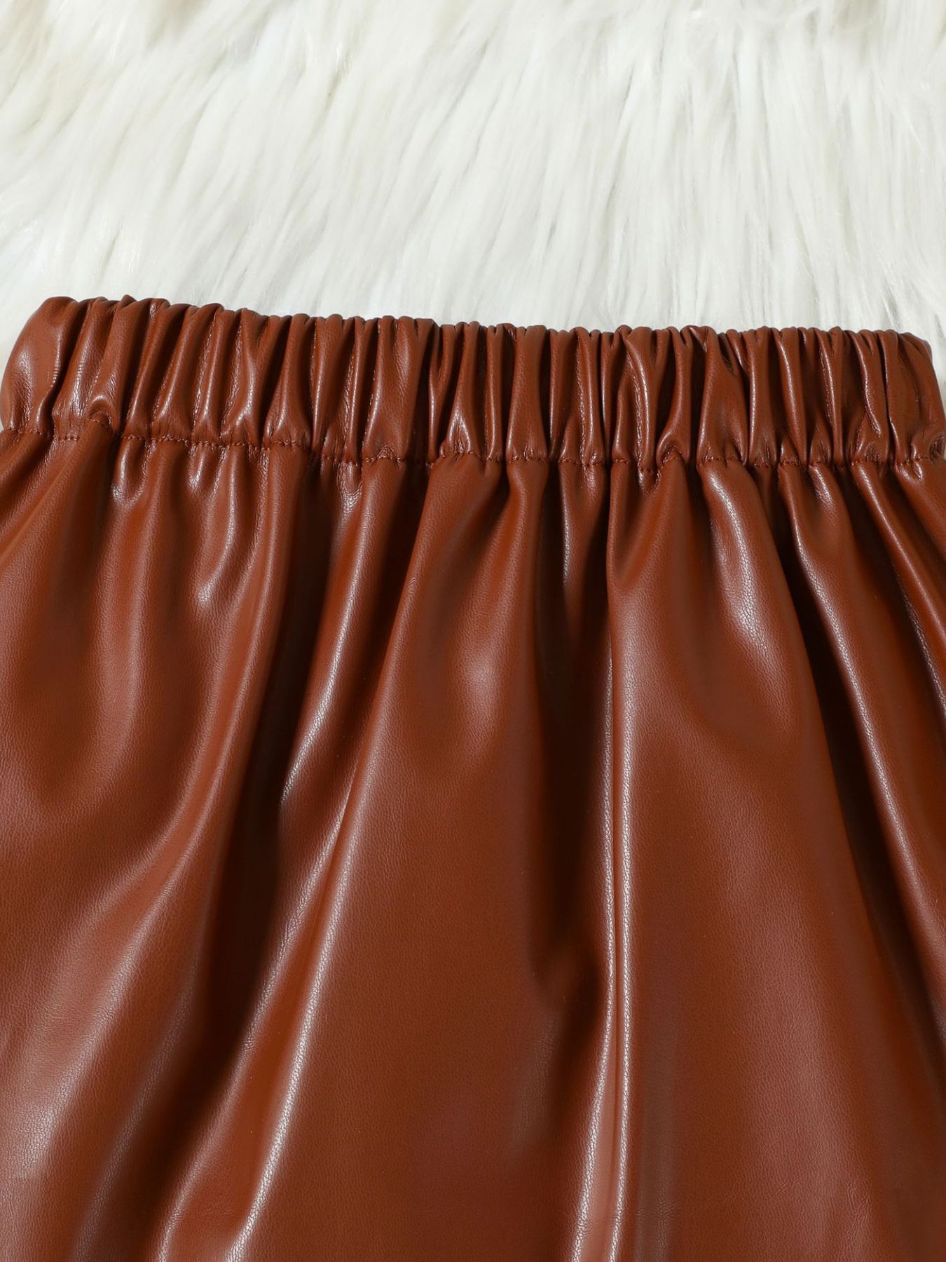 Brown faux leather baby skirt with elastic waistband