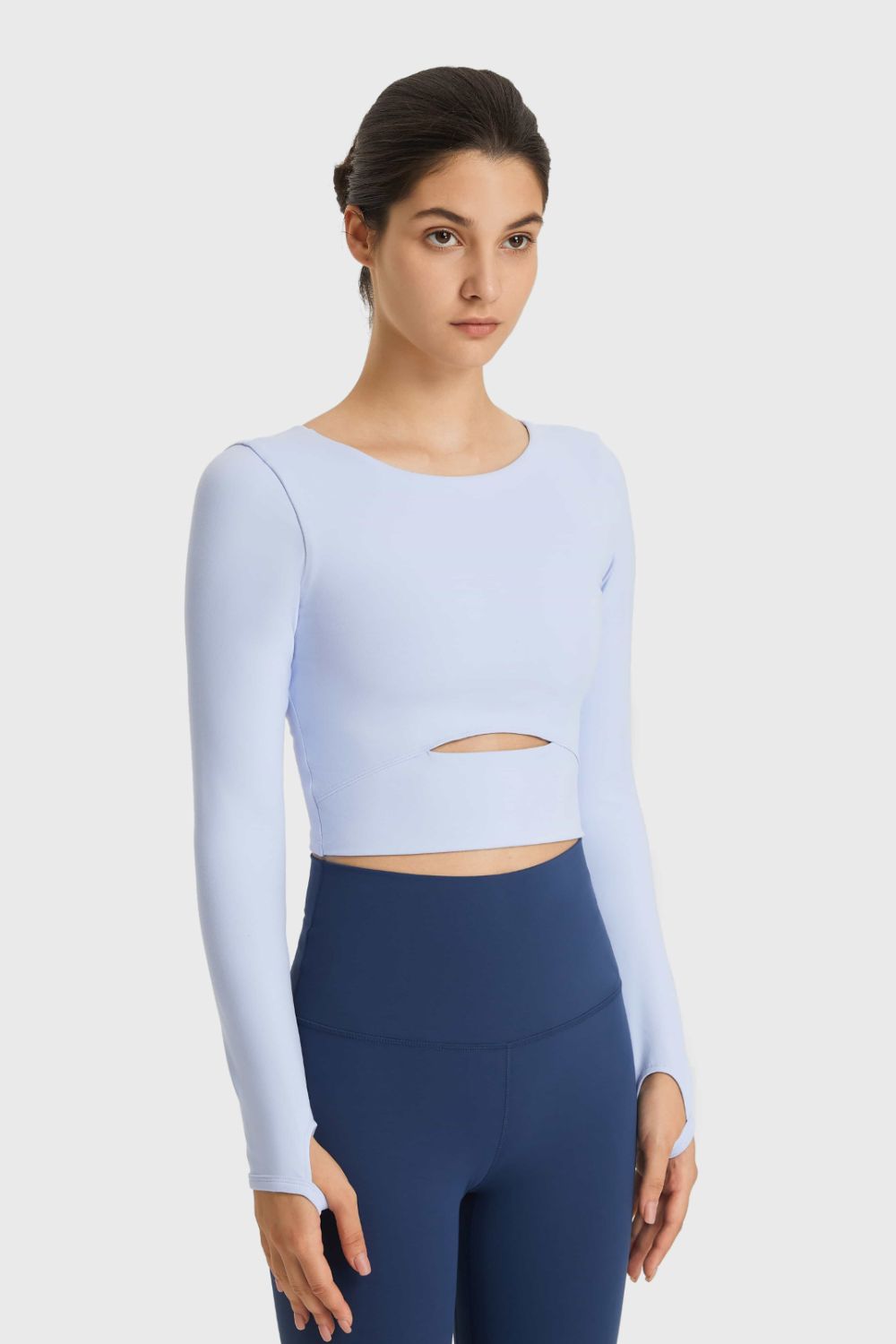 Sky blue crop top with keyhole cutout and thumbhole sleeves