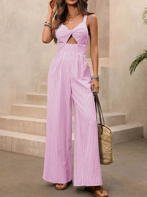 Blush pink striped jumpsuit with twist-front cutout and wide legs.