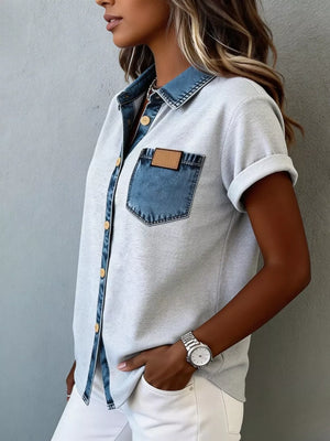 Heathered light gray short sleeve maternity shirt with denim collar, pocket, and placket details.