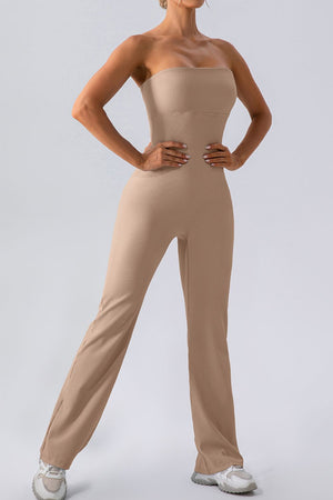 Camel ribbed bandeau flare leg jumpsuit with a seamless fit.