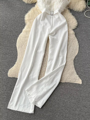 White strapless wide-leg jumpsuit with feather trim and belt detail.