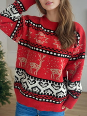 Red acrylic Fair Isle knit sweater with reindeer and snowflake pattern.