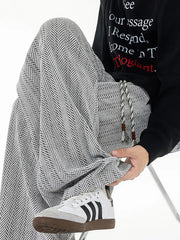 Premium Plus Size Textured Knit Sweatpants in black with herringbone pattern and drawstring detail.