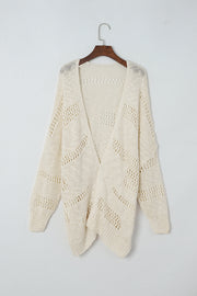Beige open-knit slouch cardigan with a relaxed fit and chevron detail.
