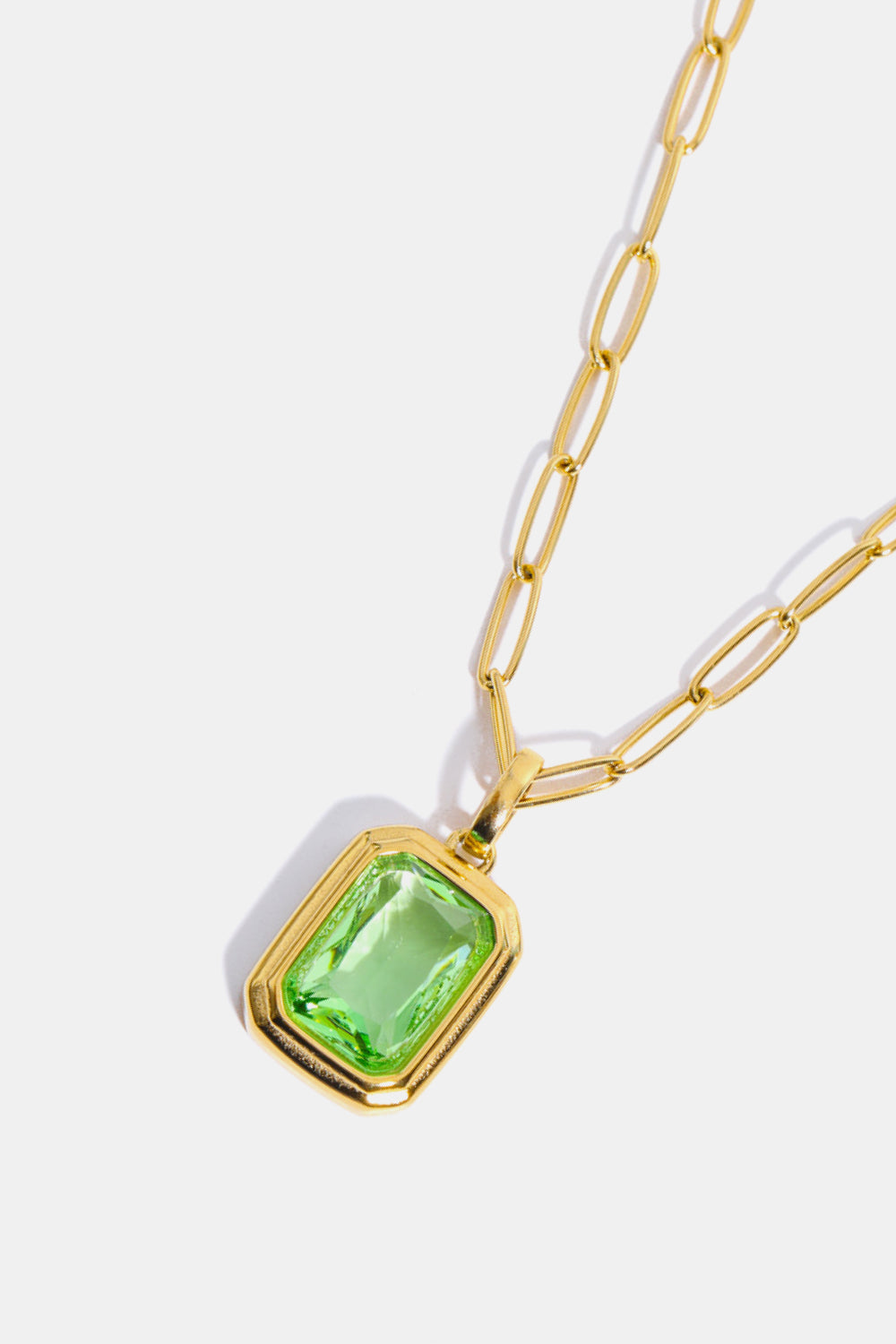 18K gold necklace with a light green rectangular prism pendant and paperclip chain.
