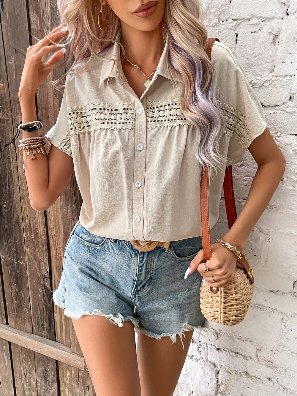 Apricot button-up shirt with lace trim and classic collar, short sleeves.
