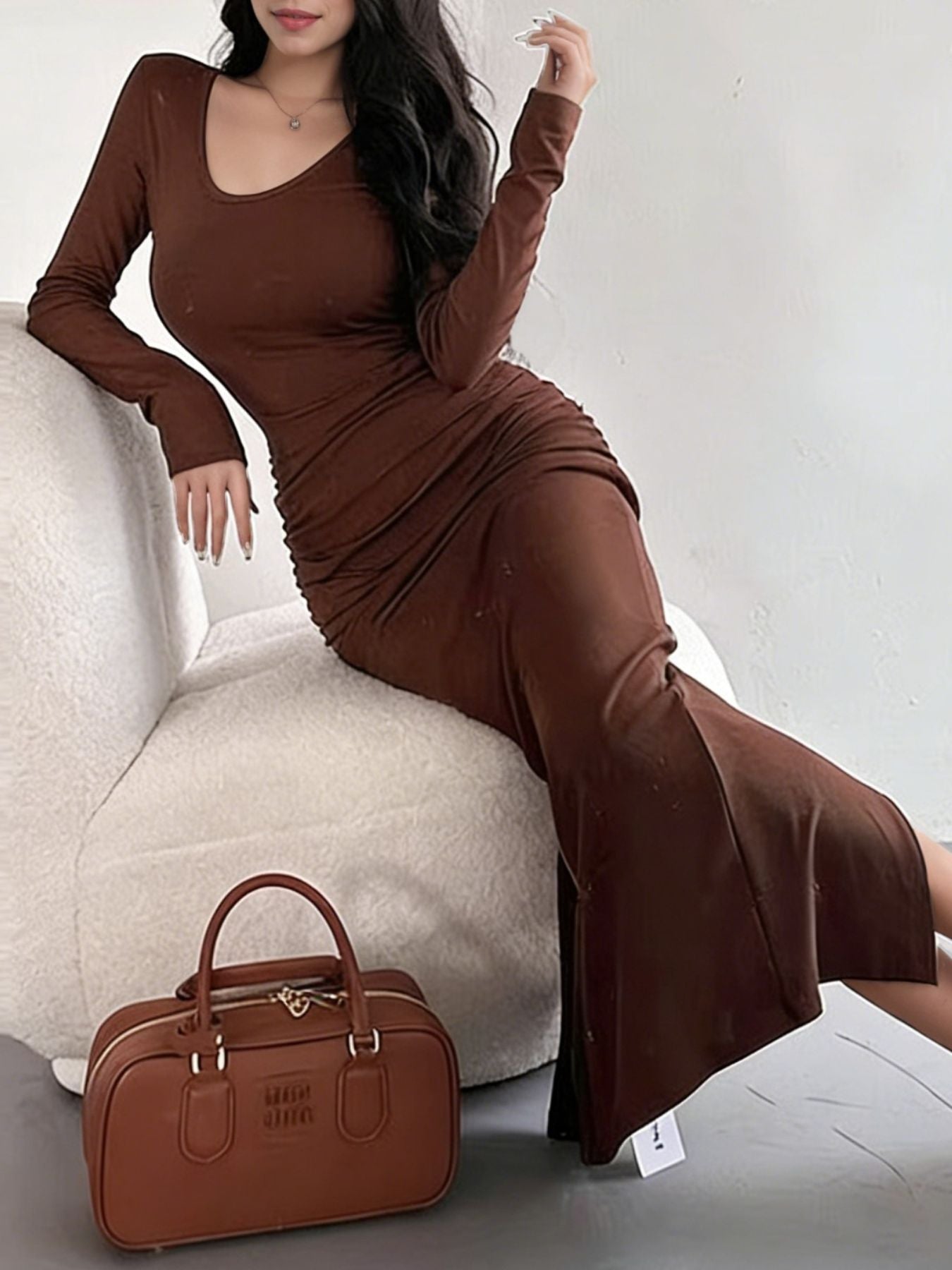 Brown ruched long-sleeve bodycon maxi dress with a scoop neck.