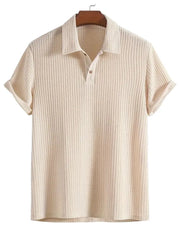 Beige textured polo shirt with a waffle knit, button placket, and cuffed rolled sleeves.