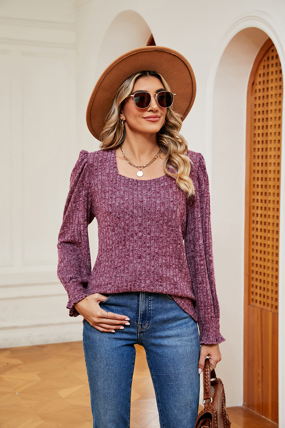 Textured square neck blouse in a muted berry hue with puff sleeves and cuffed wrists.