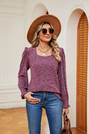 Textured square neck blouse in a muted berry hue with puff sleeves and cuffed wrists.