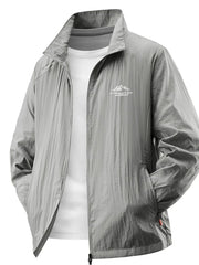Lightweight windbreaker jacket in light gray with a zip front and embroidered mountain logo.