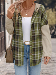 Colorblock plaid hooded shirt jacket in matcha green with button front and contrast sleeves.