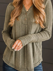 Textured henley shirt in matcha green with ribbed cuffs and button detailing.