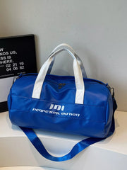 Blue pu leather sporty duffel bag with white handles and bold graphic text.