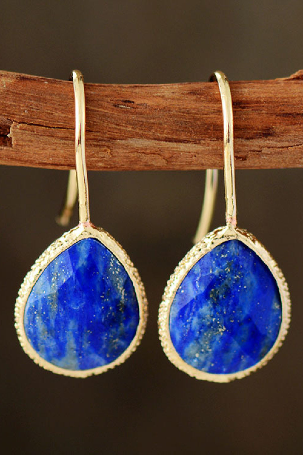 Textured royal blue gemstone drop earrings with copper accents.