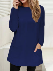 Navy relaxed fit tunic with long sleeves and two patch pockets.
