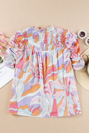Multicolor smocked puff sleeve blouse with psychedelic print
