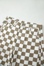 Chic checkered denim barrel pants in brown and white cotton with a button fly and pockets.