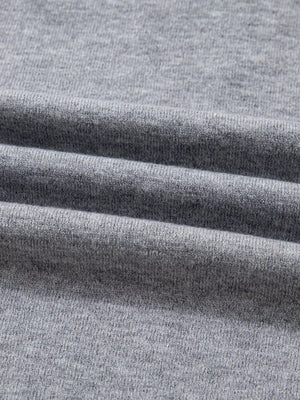 Gray ribbed V-neck sweater fabric detail