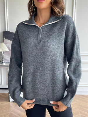 Charcoal acrylic zip-up knit sweater with contrast collar and long sleeves.
