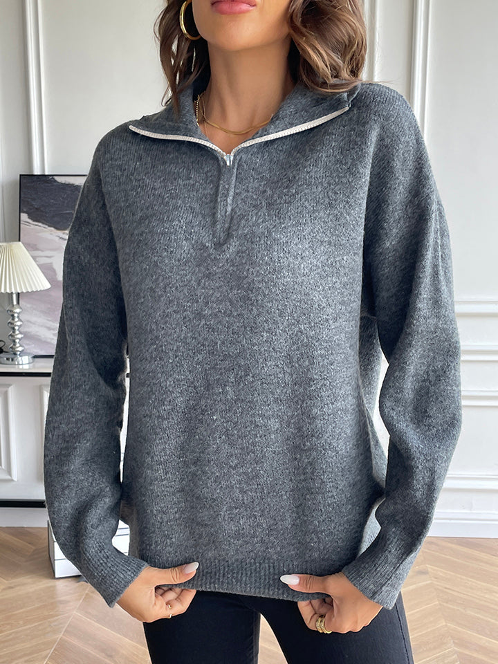 Charcoal acrylic zip-up knit sweater with contrast collar and long sleeves.