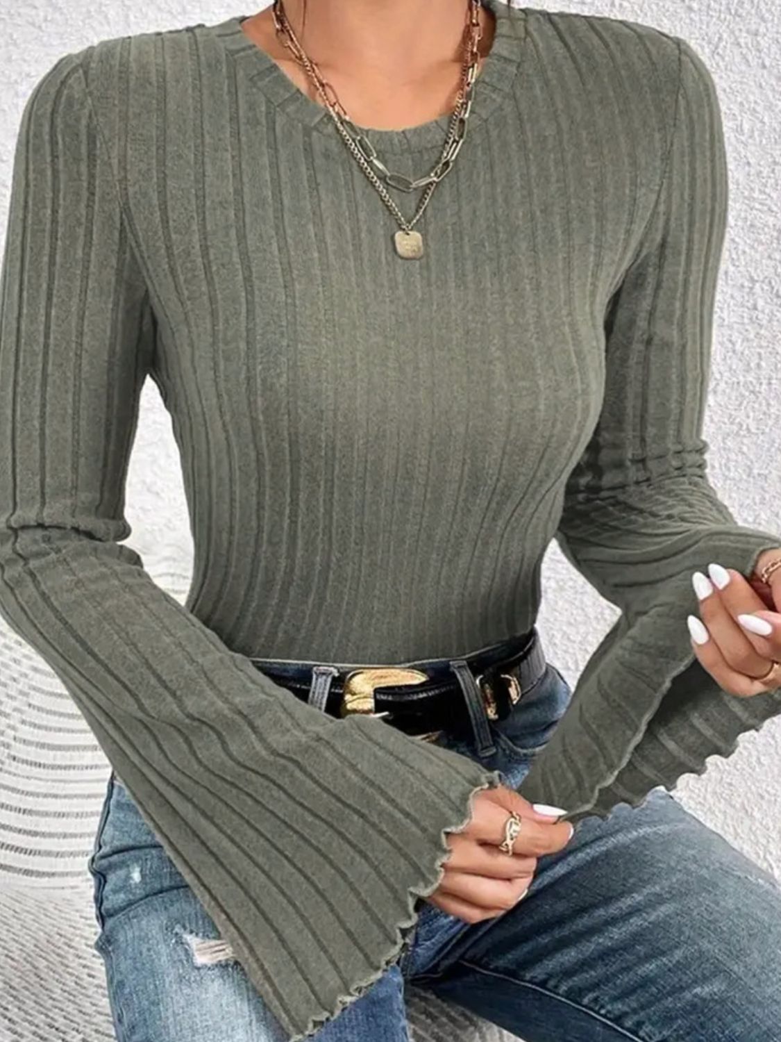 Army green ribbed knit top with scalloped bell cuffs and crew neck.
