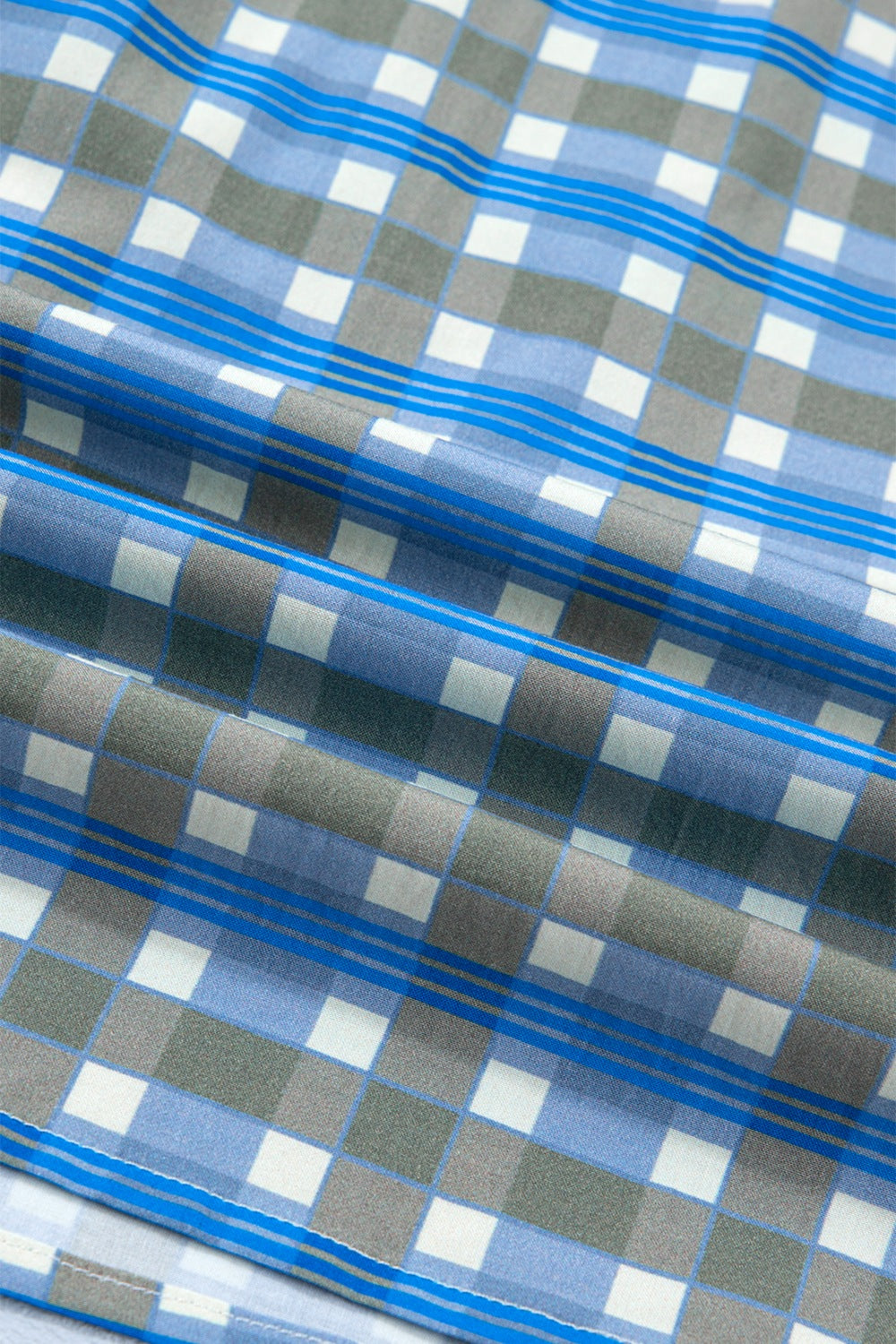Blue plaid button-down shirt with frilled detail and striped accents