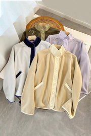 Fleece bomber jacket in tan with contrast trim and button front.