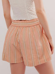 Peach striped shorts with elastic waistband and white top