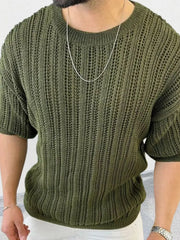 Open-knit boxy crew neck sweater in Army Green acrylic with short sleeves.