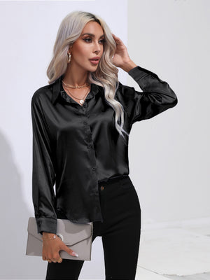 Black satin tie-front blouse with buttoned front and collar.