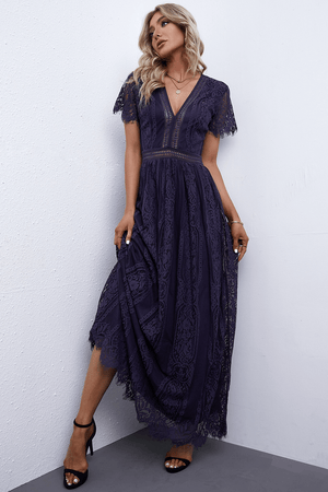 Navy lace midi dress with V-neck, flutter sleeves, and scalloped hem.