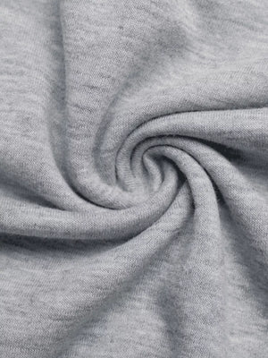 Gray boat neck sweater fabric detail, showing soft knit texture.