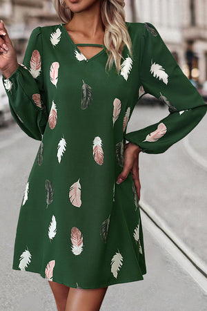 Green feather print mini dress with cutout neckline and long sleeves