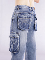 Relaxed fit light wash denim cargo jeans with flap pockets and contrast stitching.