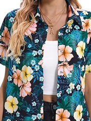 Tropical hibiscus print button-up shirt with short sleeves and a collared neckline.