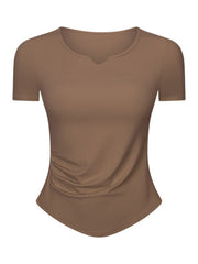 Brown ribbed active top with notch neck and ruched side detail