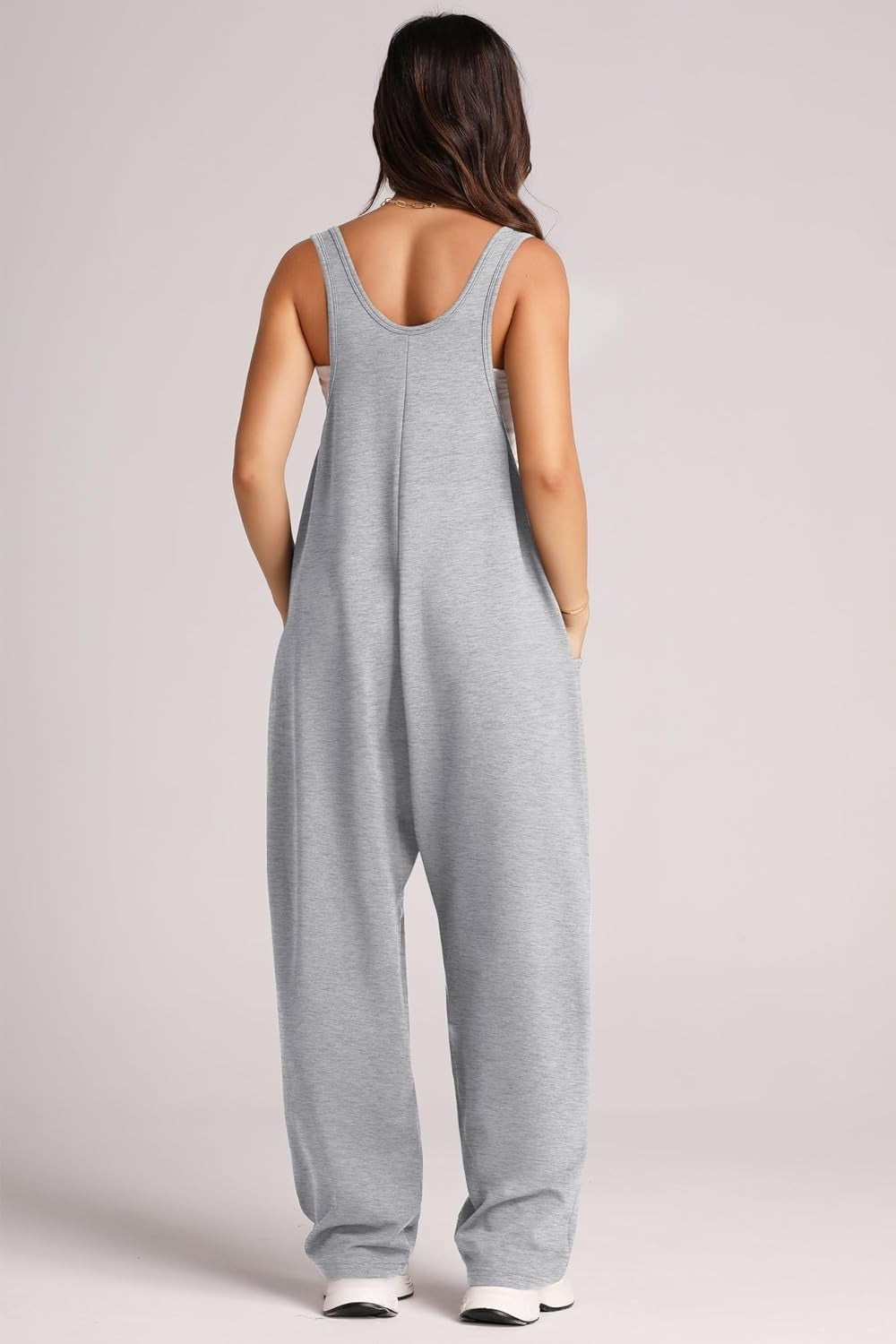 Relaxed fit gray jumpsuit with oversized pockets and scoop neckline.