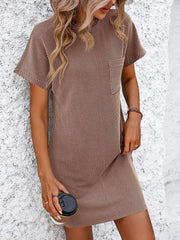 Ribbed tee dress in taupe with patch pocket and short sleeves.