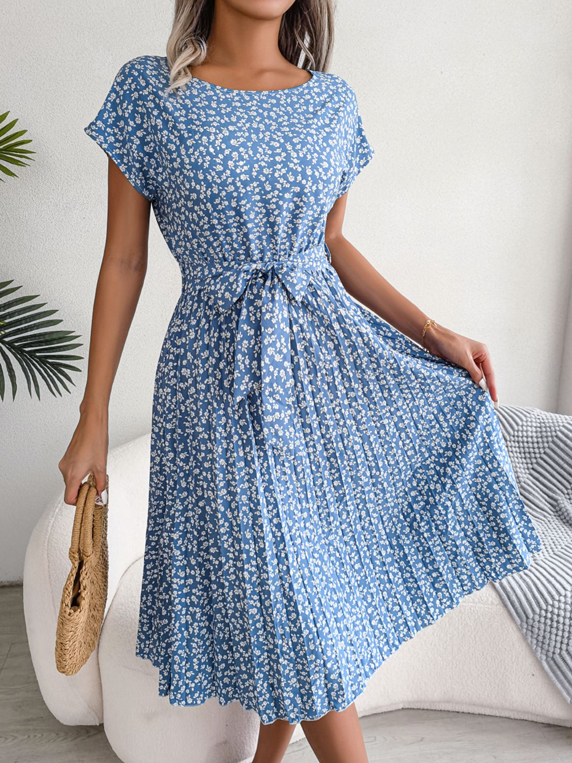Sky blue floral print midi dress with tie waist and pleated skirt