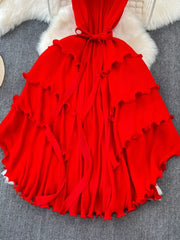 Ruffled tiered midi dress in Rose Red with belted waist and frill details.