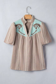 Brown gingham maternity shirt with embroidered horse yoke and puff sleeves.