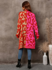 Colorblock leopard knit duster cardigan in red and pink with tan accents.