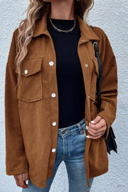 Brown waffle knit overshirt with patch pockets and button-down front.