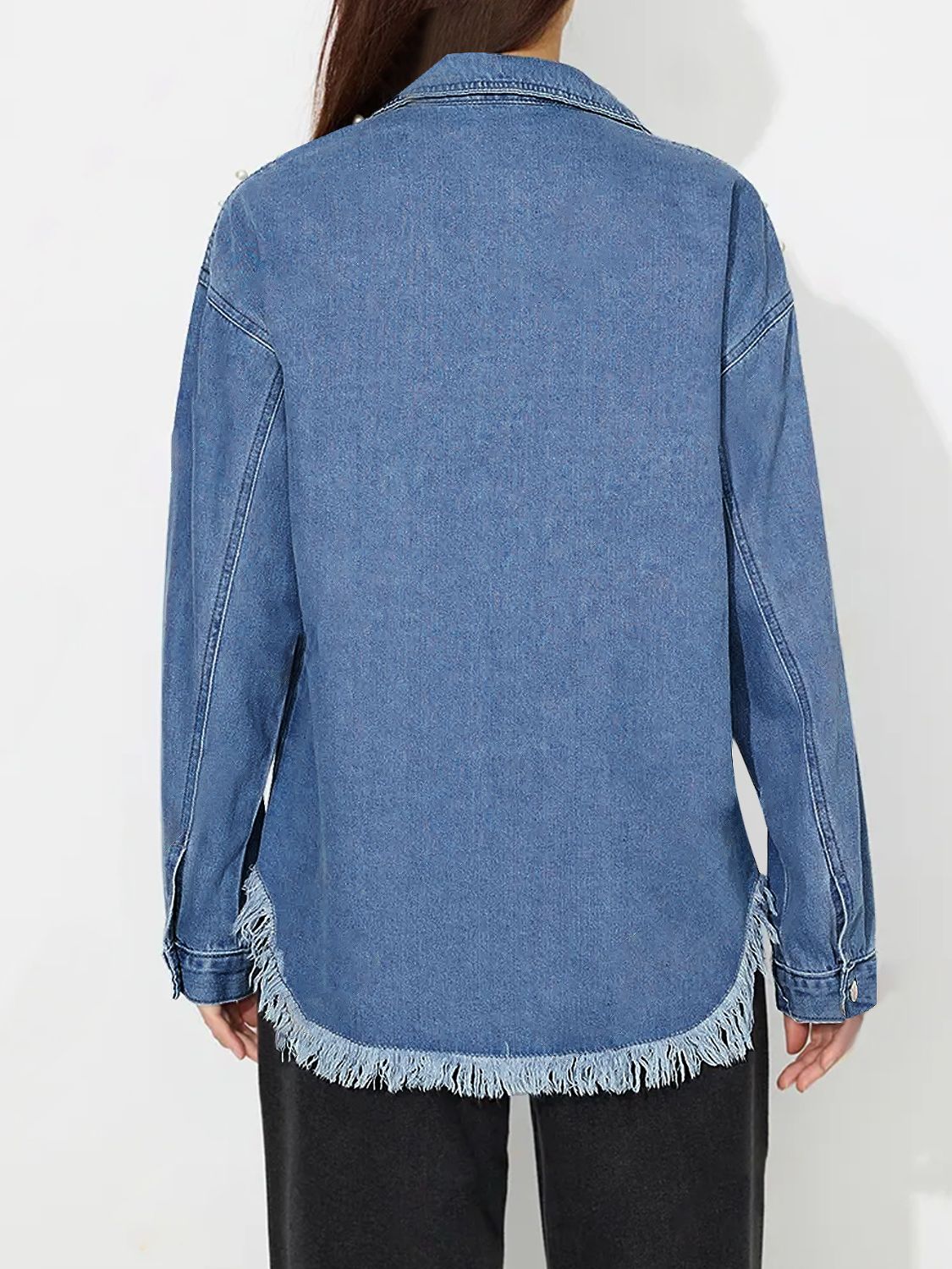 Medium wash denim shirt with pearl details and frayed hem