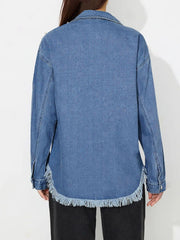 Medium wash denim shirt with pearl details and frayed hem
