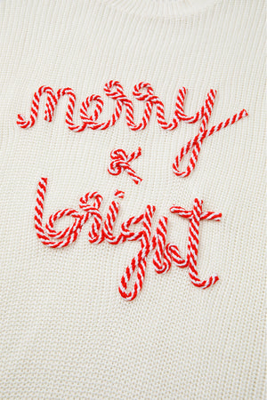 Ivory knit sweater with red and white candy cane script embroidery that reads Merry & Bright.
