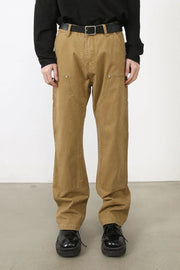 Carpenter-inspired wide leg trousers in camel with double knee detailing and utility pockets.